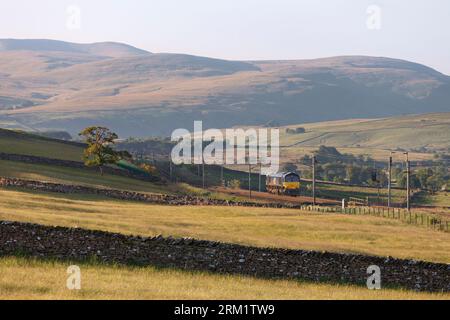Direct rail Services class 66 diesel locomotive 66091 running light engine along the west coast mainline at Salterwath (Shap Wells, Cumbria) Stock Photo
