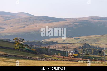 Direct rail Services class 66 diesel locomotive 66091 running light engine along the west coast mainline at Salterwath (Shap Wells, Cumbria) Stock Photo