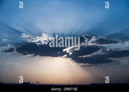 Bildnummer: 59651698  Datum: 15.05.2013  Copyright: imago/Xinhua (130516) -- CAIRO, May 15, 2013 (Xinhua) -- Photo taken on May 15, 2013 shows a sunset view over the famous Giza Pyramids in Cairo, Egypt. (Xinhua/Li Muzi) EGYPT-SUNSET-CLOUD PUBLICATIONxNOTxINxCHN xcb x2x 2013 quer o0 Totale, Himmel, Wolken,     59651698 Date 15 05 2013 Copyright Imago XINHUA  Cairo May 15 2013 XINHUA Photo Taken ON May 15 2013 Shows a Sunset View Over The Famous Giza Pyramids in Cairo Egypt XINHUA left Muzi Egypt Sunset Cloud PUBLICATIONxNOTxINxCHN  x2x 2013 horizontal o0 long shot Heaven Clouds Stock Photo