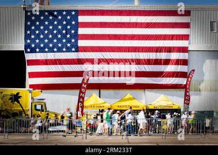 An American flag is suspended from a hanger during the 2022 Miramar Airshow at San Diego, California. Stock Photo