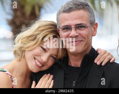 130523 -- CANNES, May 23, 2013 Xinhua -- Director Abdellatif Kechiche R and cast members Lea Seydoux pose during a photocall for the film La Vie D Adele at the 66th edition of the Cannes Film Festival in Cannes, France, May 23, 2013. Xinhua/Gao Jing FRANCE-CANNES-FILM FESTIVAL-LA VIE D ADELE-PHOTOCALL PUBLICATIONxNOTxINxCHN Stock Photo