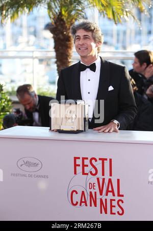 (130526) -- CANNES, May 26, 2012 (Xinhua) -- U.S. director Alexander Payne poses during a photocall with the Best Actor on behalf of U.S. actor Bruce Dern (not pictured) for the film Nebraska during a photocall at the 66th Cannes Film Festival in Cannes, France, on May 26, 2013. The festival ended here on Sunday night. (Xinhua/Gao Jing) FRANCE-CANNES-FILM FESTIVAL-AWARD PUBLICATIONxNOTxINxCHN   130526 Cannes May 26 2012 XINHUA U S Director Alexander Payne Poses during a photo call With The Best Actor ON behalf of U S Actor Bruce Dern Not Pictured for The Film Nebraska during a photo call AT Th Stock Photo