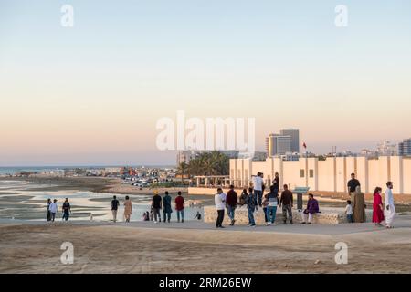 Tourists at the ruins of Tylos Fortress, Tylos Fort ruins, Bahrain Fort museum, Qal'at al-Bahrain - Bahrain Fort, Fortress in Al Qala, Bahrain Stock Photo