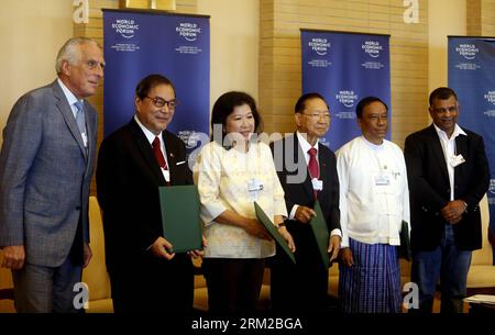 Bildnummer: 59776879  Datum: 05.06.2013  Copyright: imago/Xinhua (130605) -- NAY PYI TAW, June 5, 2013 (Xinhua) -- Officials from Myanmar, Cambodia, Indonesia and the Philippines pose for group photos after signing ceremony of a cooperation agreement on Tourism on the first day of the 22nd World Economic Forum on East Asia at Myanmar International Convention Center (MICC) in Nay Pyi Taw, Myanmar, June 5, 2013. The 22nd World Economic Forum on East Asia, hosted by Myanmar for the first time, began its sessions Wednesday at Myanmar International Convention Center ( MICC) in Nay Pyi Taw, the capi Stock Photo