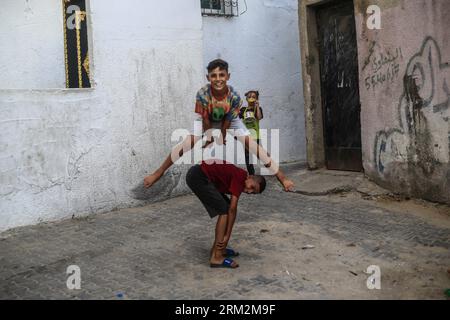 Gaza, Palestine. 26th Aug, 2023. Palestine refugee children play outside their home in the Jabalia refugee camp in the northern Gaza Strip. (Photo by Mahmoud Issa/SOPA Images/Sipa USA) Credit: Sipa USA/Alamy Live News Stock Photo