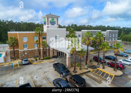 Fleming Island Jacksonville Florida,Holiday Inn Express & Suites Fleming Island IHG hotel,aerial overhead from above view,parking lot,outside exterior Stock Photo