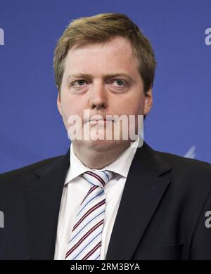 (130716) -- BRUSSELS, July 16, 2013 (Xinhua) -- Prime Minister of Iceland Sigmundur David Gunnlaugsson listens to media at a press point after meeting with European Commission President Jose Manuel Barroso (not seen) at EU headquarters in Brussels, capital of Belgium, July 16, 2013. (Xinhua/Yan Ting) (yt) BELGIUM-EU-ICELAND-PM-GUNNLAUGSSON-VISITING PUBLICATIONxNOTxINxCHN   130716 Brussels July 16 2013 XINHUA Prime Ministers of Iceland Sigmundur David Gunnlaugsson listens to Media AT a Press Point After Meeting With European Commission President Jose Manuel Barroso Not Lakes AT EU Headquarters Stock Photo
