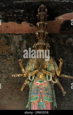 Bildnummer: 60144154  Datum: 17.07.2013  Copyright: imago/Xinhua YONGJING, July 17, 2013 (Xinhua) -- A Buddhist statue is seen at the Bingling Temple Grottoes in Yongjing County, northwest China s Gansu Province, July 17, 2013. Listed as part of the ancient Silk Road for the World Heritage candidate, the grottoes will be reviewed by experts from U.N. Educational, Scientific and Cultural Organization after renovation of a giant Buddha statue dating back more than 1,000 years to the Tang Dynasty was completed lately. Bingling Temple Grottoes, filled with Buddhist statues, stupas and murals, were Stock Photo
