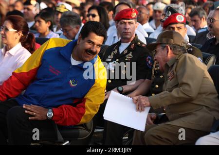 Bildnummer: 60213808  Datum: 26.07.2013  Copyright: imago/Xinhua (130726) -- SANTIAGO DE CUBA, July 26, 2013 (Xinhua) -- Image provided by Presidency of Venezuela shows Cuba s President Raul Castro (R Front) talks with Venezuela s President Nicolas Maduro (L Front) during the main activity of the 60th anniversary of the assault on the Moncada Barracks, in Santiago de Cuba City, Cuba, on July 26, 2013. Cuba on Friday commemorated the 60th anniversary of the assault on the Moncada Barracks, which is considered the beginning of the revolution led by Fidel Castro. (Xinhua/Presidency of Venezuela) Stock Photo