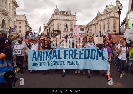 London, UK. 26th Aug, 2023. Protesters hold an 'Animal freedom' banner during the demonstration in Piccadilly Circus. Crowds marched through central London during the National Animal Rights March, demanding an end to all forms of animal exploitation and abuse, and in support of animal rights and veganism. (Photo by Vuk Valcic/SOPA Images/Sipa USA) Credit: Sipa USA/Alamy Live News Stock Photo