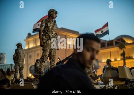 Bildnummer: 60357649  Datum: 14.08.2013  Copyright: imago/Xinhua (130814) -- CAIRO, Aug. 14, 2013 (Xinhua) -- File photo taken on July 26, 2013 shows a soldier standing guard on an armed vehicle in Cairo, Egypt. The Egyptian presidency announced on Wednesday a state of emergency nationwide for one month, due to the current turmoil over the dispersing of pro-Morsi protesters in the capital Cairo, the Egyptian state TV reported. (Xinhua/Li Muzi) EGYPT-CAIRO-EMERGENCY STATE PUBLICATIONxNOTxINxCHN Gesellschaft Politik Demo Protest x0x xdd premiumd 2013 quer      60357649 Date 14 08 2013 Copyright Stock Photo