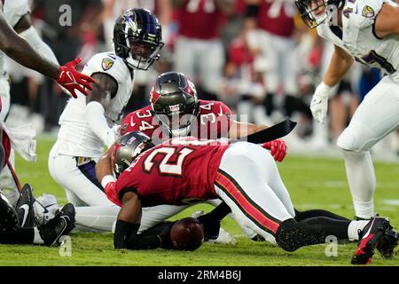 Tampa Bay Buccaneers safety Kaevon Merriweather (26) defends in the  secondary during an NFL preseason football game against the Baltimore Ravens,  Saturday, Aug. 26, 2023, in Tampa, Fla. (AP Photo/Peter Joneleit Stock