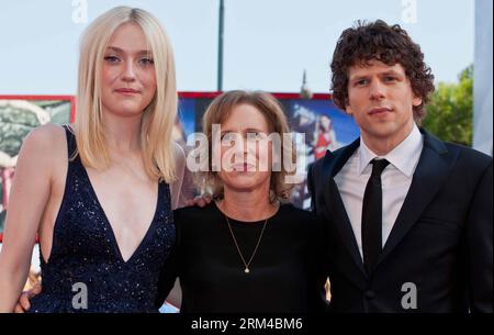 VENICE, Aug. 31, 2013 -- Dakota Fanning L, Jesse Eisenberg R and Kelly Reichardt of the 70th Venice International Film Festival movie Night Moves  poses at red carpet on the Lido island of Venice , Italy, Aug. 31, 2013. Xinhua/Yan Ting ITALY-VENICE-FILM-FESTIVAL-NIGHT MOVES PUBLICATIONxNOTxINxCHN Stock Photo