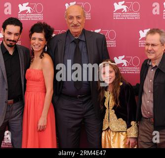 Bildnummer: 60443365  Datum: 06.09.2013  Copyright: imago/Xinhua (130906) -- VENICE, Sept. 6, 2013 (Xinhua) ¨C Director Merzak Allouache(1st,R),actress Myriam Ait el Hadj(2nd,R),actress Meriem Medjkane(2nd,L),actor Hacene Benzerari,(3nd, L) ,actor Nadjib Qulebsir(1st,R) pose at photocall of the screening of The Rooftops during the 70th Venice Film Festival, in Lido of Venice, Italy, on Sept. 6, 2013. (Xinhua/Yan Ting) ITALY-VENICE-FILM FESTIVAL-THE ROOFTOPS PUBLICATIONxNOTxINxCHN Kultur Entertainment People Film 70 Internationale Filmfestspiele Venedig xas x0x 2013 quadrat premiumd      604433 Stock Photo