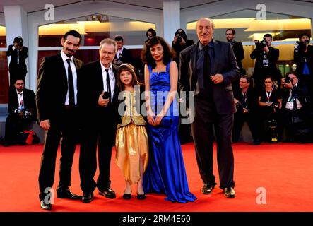 Bildnummer: 60443370  Datum: 06.09.2013  Copyright: imago/Xinhua (130906) -- VENICE, Sept. 6, 2013 (Xinhua) -- Actor Nadjib Qulebsir (1st L), actor Hacene Benzerari(1st R), director Merzak Allouache (2nd L), actress Myriam Ait el Hadj (C) and actress Meriem Medjkane (2nd R) pose on the red carpet for the movie The Rooftops during the 70th Venice Film Festival, in Lido of Venice, Italy, on Sept. 6, 2013. (Xinhua/Xu Nizhi) ITALY-VENICE-FILM-FESTIVAL-THE ROOFTOPS PUBLICATIONxNOTxINxCHN Kultur Entertainment People Film 70 Internationale Filmfestspiele Venedig xas x0x 2013 quer premiumd      604433 Stock Photo