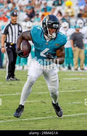 Jacksonville Jaguars running back Tank Bigsby (4) enters the field for an  NFL pre-season football game against the Miami Dolphins, Saturday, Aug. 26,  2023, in Jacksonville, Fla. The Jaguars defeated the Dolphins