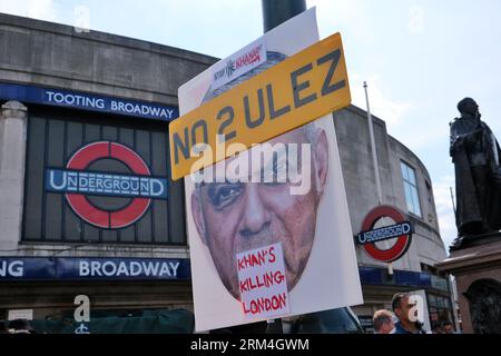 London, UK. 26th August, 2023. A 'No to ULEZ' with a photo of Sadiq Khan sign hangs outside Tooting Broadway Station. Anti-ULEZ protesters gather in the Mayor of London's constituency in Tooting, ahead of the air pollution scheme expanding and becoming effective on Tuesday 29th. Demonstrators object to the charges being implemented to clean up the Capital's air, believing it to be no more than a way to tax motorists and hitting the poorest in society the hardest. Credit: Eleventh Hour Photography/Alamy Live News Stock Photo