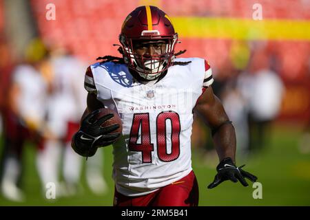 Washington Commanders running back Alex Armah (40) runs during an