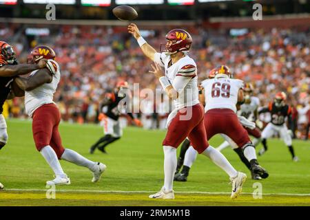 Washington Commanders quarterback Jake Fromm throws a pass during