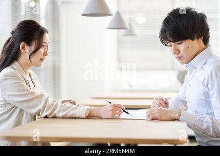 Asian business woman training newcomers Stock Photo