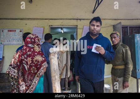 Bildnummer: 60792034  Datum: 04.12.2013  Copyright: imago/Xinhua     (131204) -- NEW DELHI, Dec. 4, 2013 (Xinhua) -- A man leaves after casting her vote for the Delhi state assembly election at a polling station in New Delhi, capital of India, on Dec. 4, 2013. New Delhi, Rajasthan, Chhattisgarh, Madhya Pradesh and Mizoram states are all voting for new state assemblies and the results will be published simultaneously after counting on December 8. (Xinhua/Zheng Huansong) INDIA-DELHI STATE ASSEMBLY ELECTION-VOTE PUBLICATIONxNOTxINxCHN Gesellschaft x2x xkg 2013 quer o0 Politik Wahl Wahlen Stimmabg Stock Photo