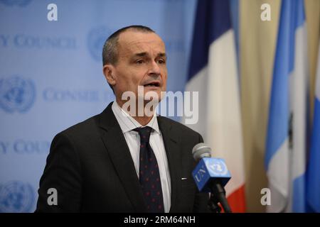 Bildnummer: 60800862  Datum: 06.12.2013  Copyright: imago/Xinhua     (131206) --NEW YORK, Dec. 6, 2013 (Xinhua) -- French Permanent Representative to the United Nations Gerard Aruad, whose country holds the rotating presidency of the UN Security Council, reads a press statement to pay tribute to the death of former South African President Nelson Mandela, at the UN headquarters in New York, the United States, on Dec. 5, 2013. (Xinhua/Niu Xiaolei) U.S.-NEW YORK-UN-MANDELA-MOURN PUBLICATIONxNOTxINxCHN People Politik x0x xkg 2013 quer premiumd Stock Photo