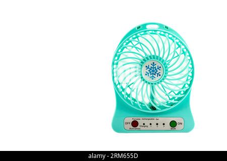 Blue portable small fan electric fan on white isolated background Stock Photo