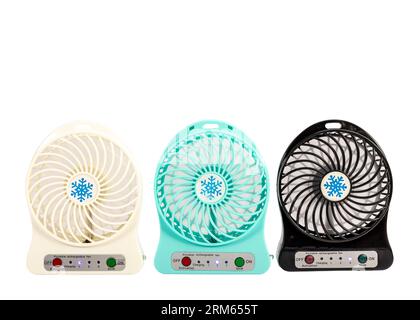 Rechargeable white, blue and black small fan on white background Stock Photo