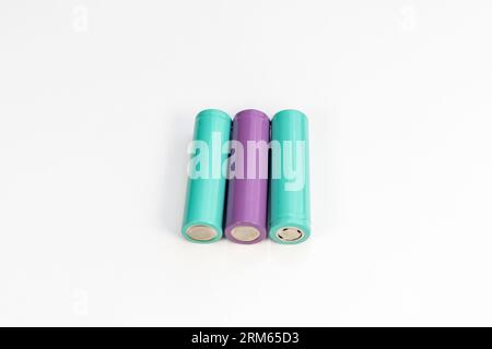 Colorful rechargeable batteries in row isolated on white background Stock Photo