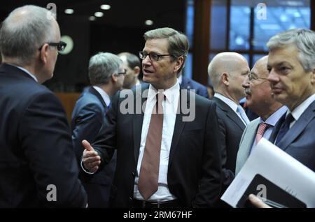 131216 -- BRUSSELS, Dec 16, 2013 xinhua -- German Foreign minister Guido Westerwelle C speaks with counterparts before an Foreign Ministers meeting at the EU Headquarters in Brussels, capital of Belgium, Dec 16, 2013. Xinhua/Ye Pingfan BELGIUM-BRUSSELS-EU-FM-MEETING PUBLICATIONxNOTxINxCHN Stock Photo
