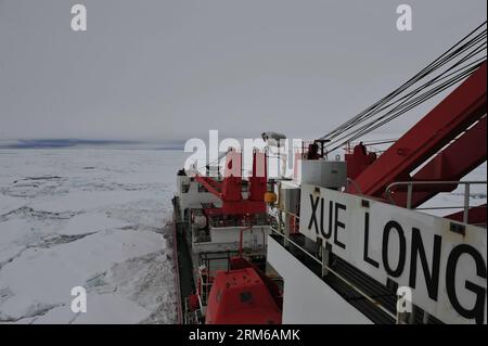 (131228) -- ABOARD XUELONG, Dec. 28, 2013 (Xinhua) -- Photo taken on Dec. 28, 2013 shows the scene around the trapped Russian science ship on Chinese icebreaker Xuelong, or Snow Dragon. Chinese icebreaker Xuelong, or Snow Dragon, on way to rescue a Russian science ship trapped off Antarctica, has stalled itself since midnight Friday after getting stuck in thick ice only 6.1 nautical miles away from the Russian ship. (Xinhua/Zhang Jiansong) (yxb) CHINA-30TH ANTARCTIC EXPEDITION-ICEBREAKER (CN) PUBLICATIONxNOTxINxCHN   Aboard XUELONG DEC 28 2013 XINHUA Photo Taken ON DEC 28 2013 Shows The Scene Stock Photo