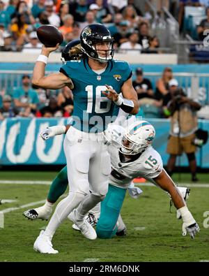 Jacksonville, United States. 26th Aug, 2023. Miami Quarterback Tua  Tagovailoa throws a short pass for a completion in the first quarter as the  Dolphins compete against the Jaguars in an NFL preseason