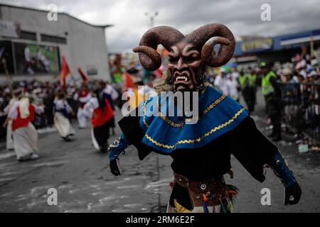 An artist participates in the Great Parade Magno in the city of Pasto, Colombia, on Jan. 6, 2014. Emblematic floats are presented in the Great Parade Magno ending the Carnival of Blacks and Whites, one of the main celebrations of Colombia.  (UNESCO) in 2009. (Xinhua/Jhon Paz) (liu) (sp) COLOMBIA-PASTO-CULTURE-CARNIVAL PUBLICATIONxNOTxINxCHN   to Artist participates in The Great Parade Magno in The City of Pasto Colombia ON Jan 6 2014 emblematic Floats are presented in The Great Parade Magno ending The Carnival of Blacks and Whites One of The Main celebrations of Colombia Unesco in 2009 XINHUA Stock Photo