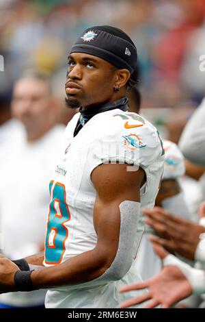 Miami Dolphins wide receiver Erik Ezukanma (18) warms up before an