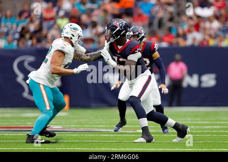 Miami Dolphins offensive tackle Ryan Hayes (76) and Houston Texans  defensive end Ali Gaye (73) during an NFL preseason football game,  Saturday, Aug. 19, 2023, in Houston. (AP Photo/Tyler Kaufman Stock Photo -  Alamy