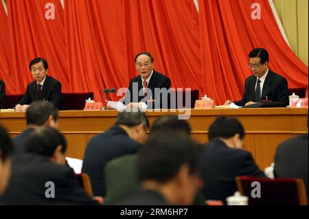 BEIJING, Jan. 13, 2014 -  Wang Qishan (back, C), a member of the Standing Committee of the Political Bureau of the Communist Party of China (CPC) Central Committee and secretary of the CPC Central Commission for Discipline Inspection (CCDI), gives a work report about the anti-corruption fight and the Party s integrity construction during the third plenary session of the 18th CPC Central Commission for Discipline Inspection, in Beijing, capital of China, Jan. 13, 2014. (Xinhua/Liu Weibing) (mt) CHINA-BEIJING-DISCIPLINE INSPECTION-THIRD PLENARY SESSION (CN) PUBLICATIONxNOTxINxCHN   Beijing Jan 1 Stock Photo