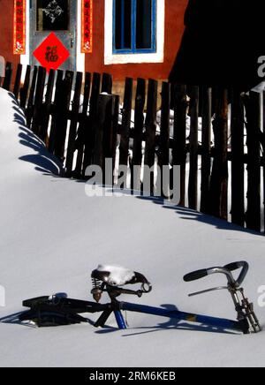 (140118) -- ZHENGZHOU, Jan. 18, 2014 (Xinhua) -- Photo taken on Feb. 24, 2006 shows a bike buried by snow in the court of a family in in a forestry centre in northeast China s Heilongjiang Province. The Chinese Character fu , which means good luck , is common everywhere across China during the Spring Festival. It is popular for its propitious meaning, also can be interpreted as happiness , which the Chinese people believe will give them blessing in the coming new year. (Xinhua/Wang Song) (zwx) CHINA-SPRING FESTIVAL-CHINESE CHARACTER FU (CN) PUBLICATIONxNOTxINxCHN   Zhengzhou Jan 18 2014 XINHUA Stock Photo