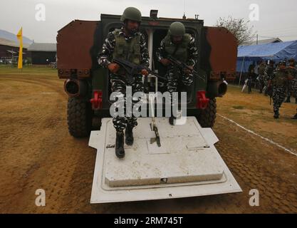 August 26, 2023, Srinagar Kashmir, India : Indian paramilitary Central Reserve Police Force (CRPF) soldiers coming out from a sophisticated vehicle during a demo of the two latest vehicles inducted by the CRPF at Lethpora in Pulwama, 20 km south of Srinagar. The CRPF inducted India-made Wheeled Armoured Amphibious Platform (WhAP) and Critical Situation Response Vehicles (CSRV) vehicles for operational purposes in Kashmir including law and order situations and countering militant activities. The sophisticated WhAP vehicle is capable of operating on land and also in marshy areas and streams usin Stock Photo