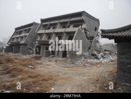 (140220) -- BEIJING, Feb. 20, 2014 (Xinhua) -- Illegal houses are demolished in Zhenggezhuang Village, Beiqijia Township of Changping District on the outskirt of Beijing, China, Feb. 20, 2014. Those illegal houses cover an area of 108.55 mu (about 7.24 hectares) , which will be used for tree planting after complete of demolition. (Xinhua/Luo Xiaoguang) (hdt) CHINA-BEIJING-CHANGPING-ILLEGAL HOUSES-DEMOLITION (CN) PUBLICATIONxNOTxINxCHN   Beijing Feb 20 2014 XINHUA illegal Houses are Demolished in  Village  Township of Chang Ping District ON The outskirts of Beijing China Feb 20 2014 Those illeg Stock Photo