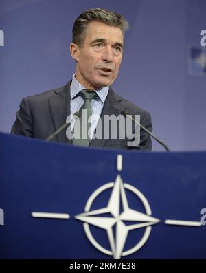(140227) -- BRUSSELS, Feb. 27, 2014 (Xinhua) -- NATO Secretary General Anders Fogh Rasmussen speaks during a media briefing at the end of a 2-day NATO Defence Ministers Meeting on the latest developments in Ukraine at the NATO headquarters in Brussels, capital of Belgium, Feb. 27, 2014. (Xinhua/Ye Pingfan) BELGIUM-BRUSSELS-NATO-DEFENCE MINISTERS MEETING-RASMUSSEN PUBLICATIONxNOTxINxCHN   Brussels Feb 27 2014 XINHUA NATO Secretary General Anders Fogh Rasmussen Speaks during a Media Briefing AT The End of a 2 Day NATO Defence Minister Meeting ON The Latest Developments in Ukraine AT The NATO Hea Stock Photo