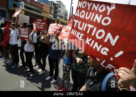 (140228) -- MANILA, Feb. 28, 2014 (Xinhua) -- Student activists march during a protest rally against tuition fee hikes in Manila, the Philippines, Feb. 28, 2014. The students condemned the annual increase in tuition fees in more than 400 schools all over the country. (Xinhua/Rouelle Umali) PHILIPPINES-MANILA-RALLY PUBLICATIONxNOTxINxCHN   Manila Feb 28 2014 XINHUA Student activists March during a Protest Rally against tuition Fee hikes in Manila The Philippines Feb 28 2014 The Students condemned The Annual Increase in tuition Fees in More than 400 Schools All Over The Country XINHUA  Umali Phi Stock Photo