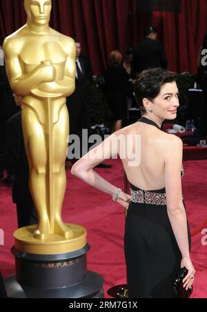 Actress Anne Hathaway arrives for the red carpet of the 86th Academy Awards at the Dolby Theater in Los Angeles, the United States, March 2, 2014. (Xinhua/Yang Lei)(yy) US-LOS ANGELES-OSCARS-RED CARPET ARRIVALS PUBLICATIONxNOTxINxCHN   actress Anne Hathaway arrives for The Red Carpet of The 86th Academy Awards AT The Dolby Theatre in Los Angeles The United States March 2 2014 XINHUA Yang Lei yy U.S. Los Angeles Oscars Red Carpet Arrivals PUBLICATIONxNOTxINxCHN Stock Photo