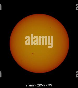 London, UK. 27th Aug, 2023. Two large Earth facing sunspots visible through solar safe filters on the sun's surface during the current Solar Cycle 25. Credit: Malcolm Park/Alamy Live News Stock Photo