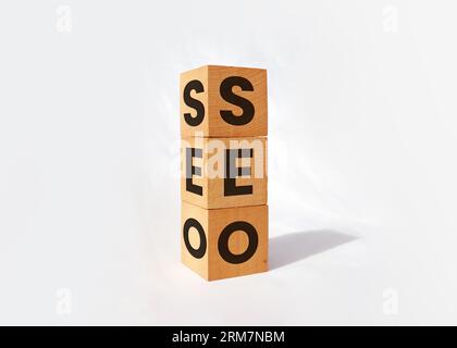 SEO (Search Engine Optimization) text wooden cubes on a white background. Idea, Vision, Strategy, Analysis, Keywords and Content Concept Stock Photo