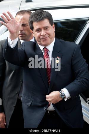(140311) -- SANTIAGO, (Xinhua) -- Paraguay s President Horacio Cartes waves upon his arrival prior to a bilateral meeting with the elected Chilean President Michelle Bachelet at the Diplomatic Academy of Chile, in Santiago, capital of Chile, March 10, 2014. Bachelet is to be sworn in on March 11. (Xinhua/Jorge Villegas) CHILE-SANTIAGO-POLITICS-BACHELET PUBLICATIONxNOTxINxCHN   Santiago XINHUA Paraguay S President Horacio Cartes Waves UPON His Arrival Prior to a bilaterally Meeting With The Elected Chilean President Michelle Bachelet AT The Diplomatic Academy of Chile in Santiago Capital of Chi Stock Photo