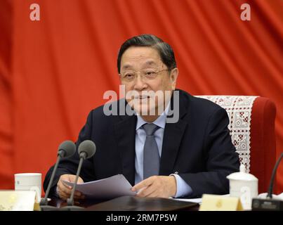 (140311) -- BEIJING, March 11, 2014 (Xinhua) -- Yu Zhengsheng, chairman of the National Committee of the Chinese People s Political Consultative Conference (CPPCC) and a member of the Standing Committee of the Political Bureau of the Communist Party of China (CPC) Central Committee, presides over the 14th meeting of the chairman and vice-chairpersons of the 12th CPPCC National Committee in Beijing, capital of China, March 11, 2014. (Xinhua/Ma Zhancheng) (zkr) (TWO SESSIONS) CHINA-BEIJING-CPPCC-YU ZHENGSHENG-MEETING (CN) PUBLICATIONxNOTxINxCHN   Beijing March 11 2014 XINHUA Yu Zheng Sheng Chair Stock Photo