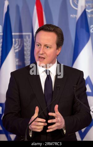JERUSALEM, March 12, 2014 (Xinhua) -- Visiting British Prime Minister David Cameron addresses a joint news conference with Israeli Prime Minister Benjamin Netanyahu following their meeting in Jerusalem, on March 12, 2014. British Prime Minister David Cameron on Wednesday called on the Israeli Knesset (parliament) to reach out for historic peace with Palestinians, ring his first visit to Israel as prime minister. British Prime Minister David Cameron is on a two-day visit to Israel and Palestinian territories. (Xinhua/POOL/Menahem Kahana) (zjl) MIDEAST-ISRAEL-BRITAIN-DIPLOMACY PUBLICATIONxNOTxIN Stock Photo