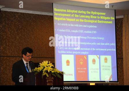 (140403) -- HO CHI MINH CITY, April 3, 2014 (Xinhua) -- Zhong Yong, a member of Ministry of Water Resourses of China, speaks during the Second Mekong River Commission (MRC) Summit in Ho Chi Minh City, Vietnam, April 2, 2014. The two-day international conference on Cooperation for Water, Energy, and Food Security in Trans-boundary Basins under Changing Climate kicked off in Vietnam s southern Ho Chi Minh (HCM) City on Wednesday. (Xinhua/Nguyen Le Huyen) (djj) VIETNAM-HO CHI MINH CITY-MEKONG RIVER COMMISSION SUMMIT PUBLICATIONxNOTxINxCHN   Ho Chi Minh City April 3 2014 XINHUA Zhong Yong a member Stock Photo