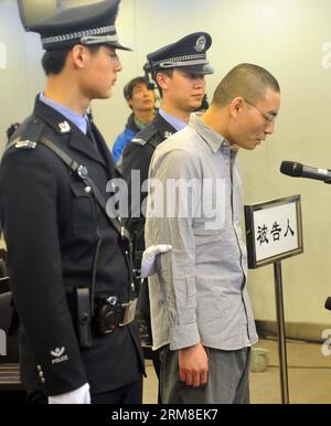 (140411) -- BEIJING, April 11, 2014 (Xinhua) -- Qin Zhijun, an alleged rumormonger, stood trial at the Chaoyang District People s Court in Beijing, capital of China, April 11, 2014. Qin Zhihui, known as Qinhuohuo in cyberspace, was accused of creating and spreading rumors about several Chinese celebrities including popular TV hostess Yang Lan, as well as China s former Ministry of Railways, via Sina Weibo, China s Twitter-like service, from December 2012 to August 2013, according to prosecutors. (Xinhua/Gong Lei) (lfj) CHINA-BEIJING-ALLEGED RUMORMONGER-TRIAL (CN) PUBLICATIONxNOTxINxCHN   Beiji Stock Photo