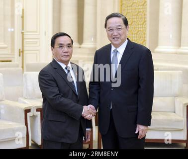 (140411) -- BEIJING, April 11, 2014 (Xinhua) -- Yu Zhengsheng (R), chairman of the National Committee of the Chinese People s Political Consultative Conference (CPPCC), meets with visiting Prime Minister of Laos Thongsing Thammavong in Beijing, capital of China, April 11, 2014. (Xinhua/Zhang Duo) (zgp) CHINA-BEIJING-YU ZHENGSHENG-THONGSING THAMMAVONG-MEETING (CN) PUBLICATIONxNOTxINxCHN   Beijing April 11 2014 XINHUA Yu Zheng Sheng r Chairman of The National Committee of The Chinese Celebrities S Political Consultative Conference CPPCC Meets With Visiting Prime Ministers of Laos Sing Thong Tham Stock Photo